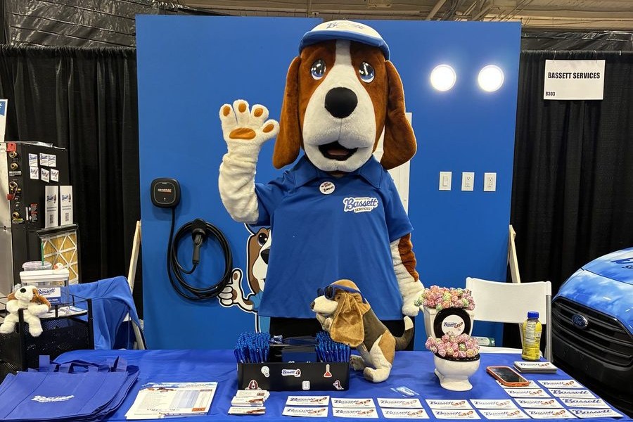 Bassett Services booth and mascot at the Indianapolis Home Show