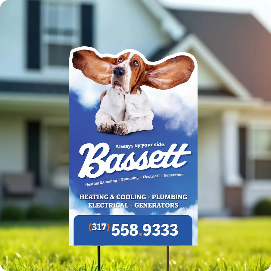Bassett Services yard sign in the front lawn of a home